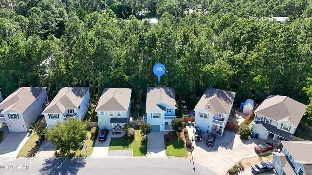 76 Mosaic Oaks Cir, Santa Rosa Beach, FL 32459 - aerial perspective of suburban area featuring a heavily wooded area