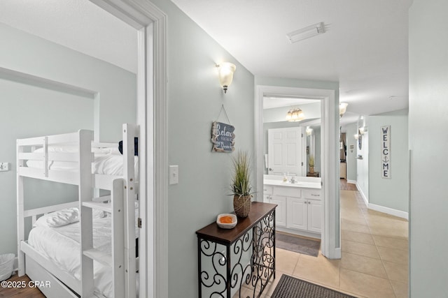14825 Front Beach Rd Unit 2210, Panama City Beach, FL 32413 - hall with light tile patterned floors and a sink