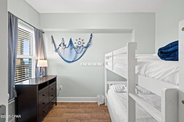 14825 Front Beach Rd Unit 2210, Panama City Beach, FL 32413 - bedroom featuring wood finished floors and baseboards