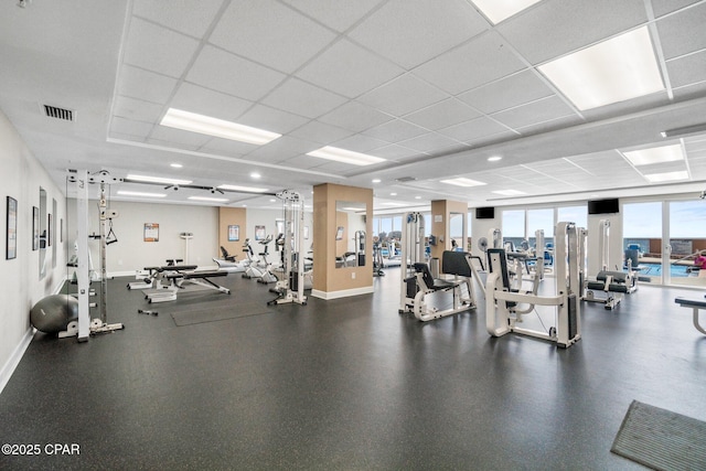 14825 Front Beach Rd Unit 2210, Panama City Beach, FL 32413 - exercise room featuring a drop ceiling and baseboards