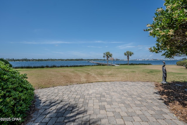view of patio featuring a water view