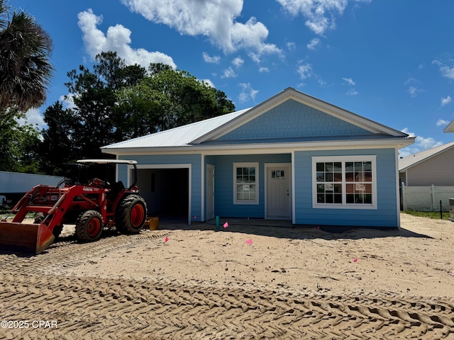 308 Benicia Pl, Panama City Beach, FL 32413 - single story home featuring a garage and a porch