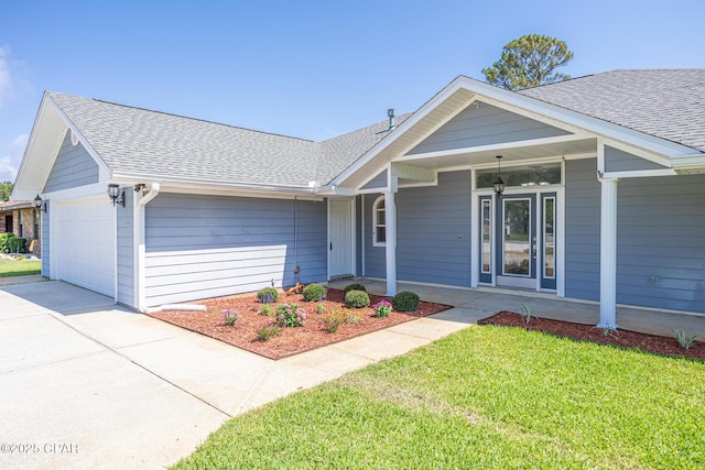 468 Forest Shore Dr, Miramar Beach, FL 32550 - single story home featuring a garage, a shingled roof, concrete driveway, a porch, and a front yard