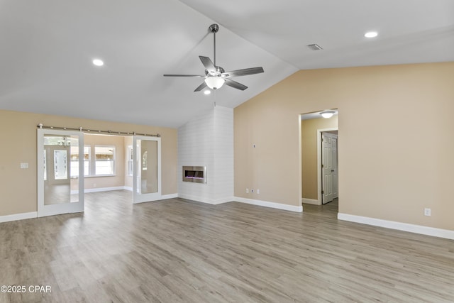 468 Forest Shore Dr, Miramar Beach, FL 32550 - unfurnished living room featuring lofted ceiling, a ceiling fan, wood finished floors, baseboards, and recessed lighting
