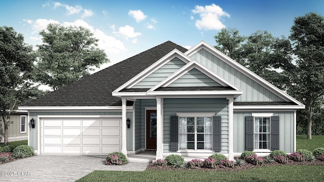 view of front of home with a garage, driveway, a shingled roof, and board and batten siding