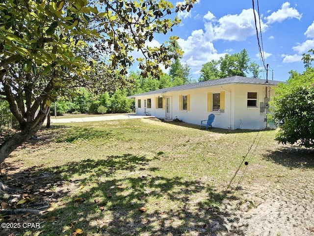 9541 Stauber Ln, Youngstown, FL 32466 - view of front facade with a front lawn