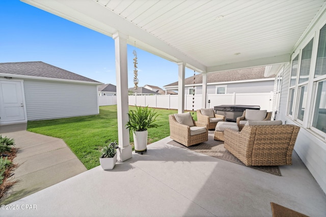 1009 N Discovery Loop, Panama City, FL 32405 - view of patio / terrace featuring a hot tub and an outdoor hangout area
