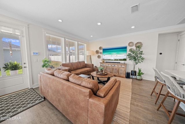 1009 N Discovery Loop, Panama City, FL 32405 - living area featuring recessed lighting, crown molding, baseboards, and wood finished floors