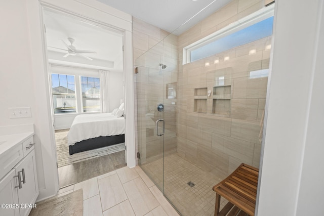 1009 N Discovery Loop, Panama City, FL 32405 - full bath with vanity, plenty of natural light, a shower stall, and ceiling fan