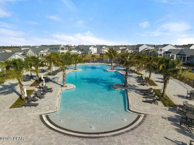 1009 N Discovery Loop, Panama City, FL 32405 - community pool with a residential view and a patio area