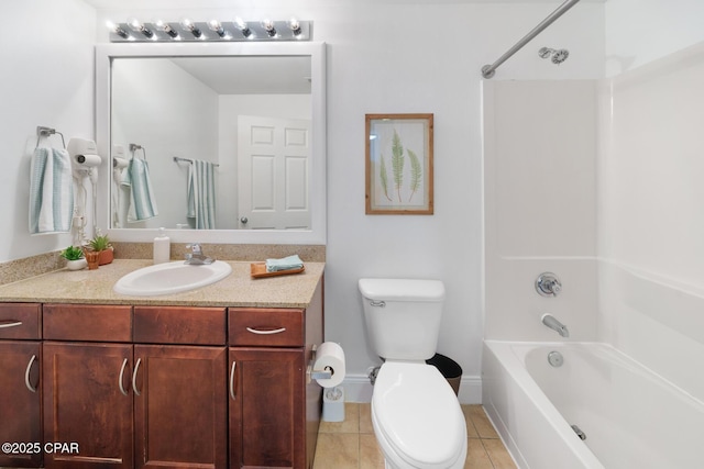 bathroom with tile patterned flooring, toilet, washtub / shower combination, vanity, and baseboards