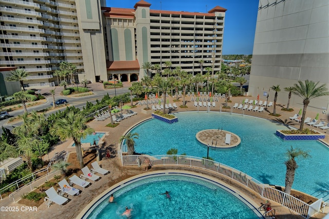 view of pool featuring a jacuzzi