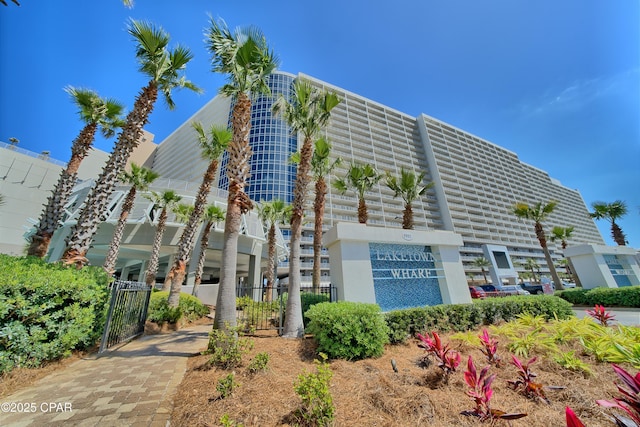 view of building exterior featuring fence