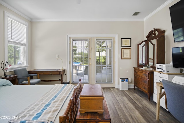 16532 SW Mimosa St, Blountstown, FL 32424 - bedroom with access to exterior, ornamental molding, wood finished floors, french doors, and baseboards