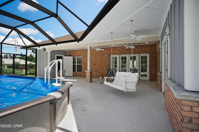 16532 SW Mimosa St, Blountstown, FL 32424 - outdoor pool featuring french doors, ceiling fan, a patio, and glass enclosure