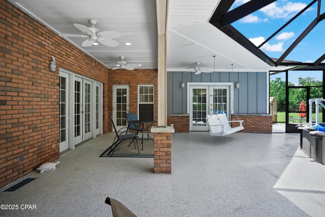 16532 SW Mimosa St, Blountstown, FL 32424 - view of patio / terrace with french doors, a ceiling fan, and glass enclosure