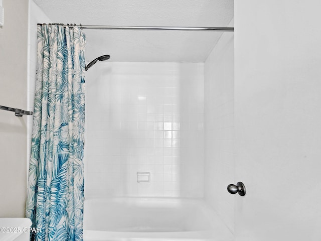 6505 Thomas Dr Unit 1009B, Panama City Beach, FL 32408 - full bathroom with shower / bath combo and toilet