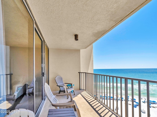 6505 Thomas Dr Unit 1009B, Panama City Beach, FL 32408 - balcony featuring view of water and beach