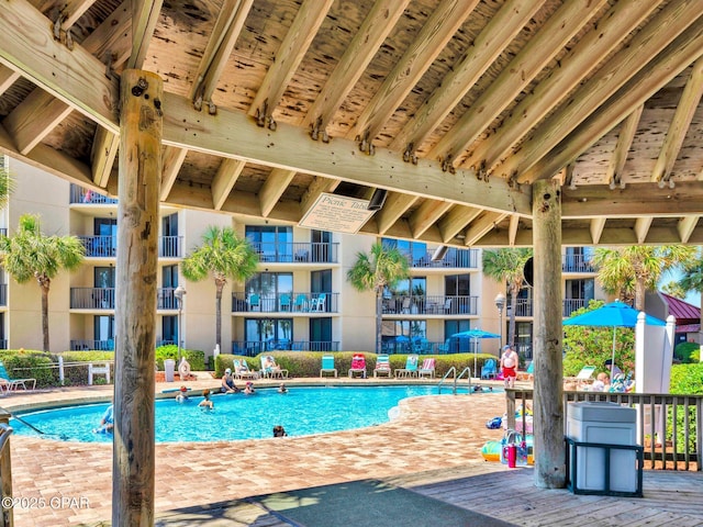 6505 Thomas Dr Unit 1009B, Panama City Beach, FL 32408 - community pool featuring a patio