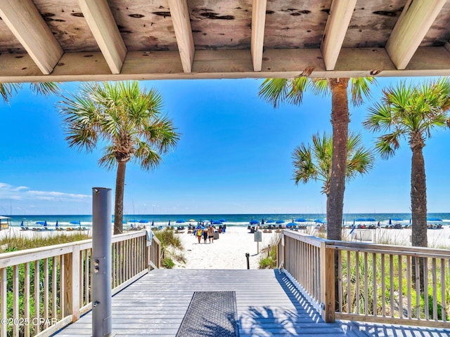 6505 Thomas Dr Unit 1009B, Panama City Beach, FL 32408 - wooden terrace with view of water and beach