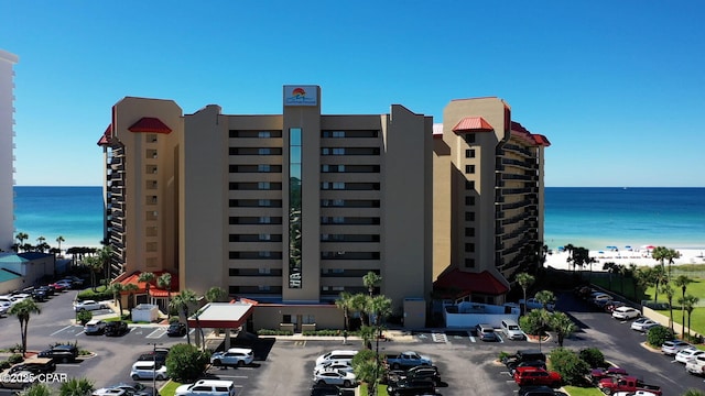 6505 Thomas Dr Unit 1009B, Panama City Beach, FL 32408 - view of building exterior featuring a water view