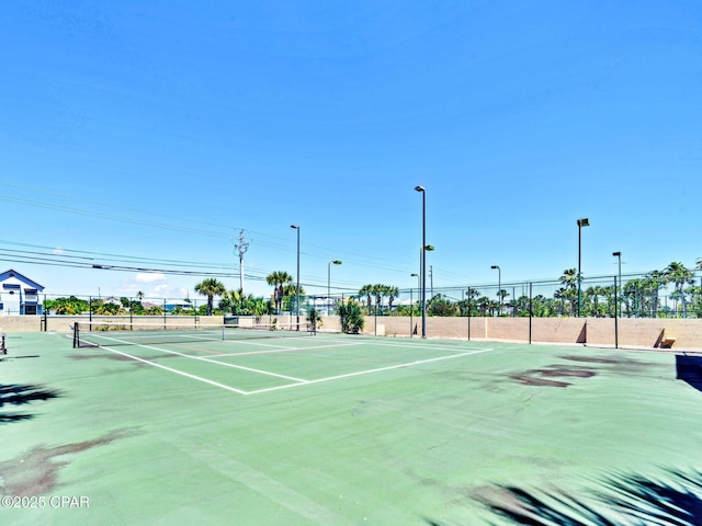 6505 Thomas Dr Unit 1009B, Panama City Beach, FL 32408 - view of tennis court with fence
