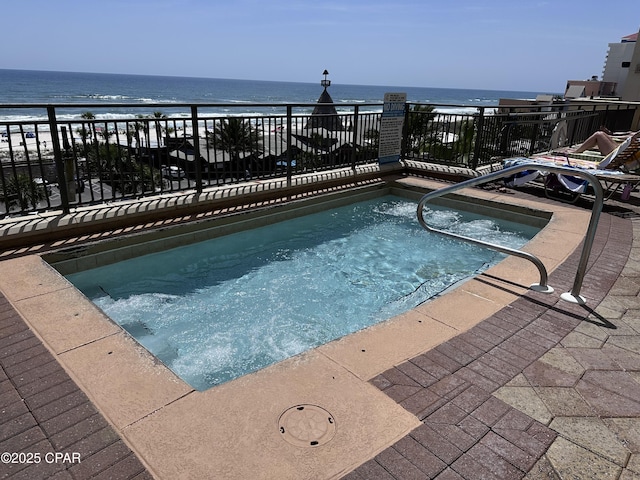 15100 Front Beach Rd Unit 1416, Panama City Beach, FL 32413 - view of swimming pool with view of water and beach and a swimming pool