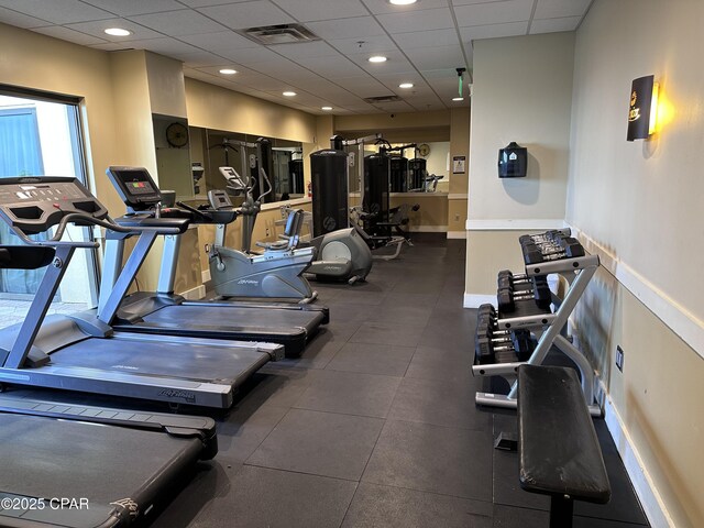15100 Front Beach Rd Unit 1416, Panama City Beach, FL 32413 - workout area with a paneled ceiling and baseboards