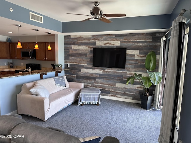 15100 Front Beach Rd Unit 1416, Panama City Beach, FL 32413 - living room with carpet and a ceiling fan
