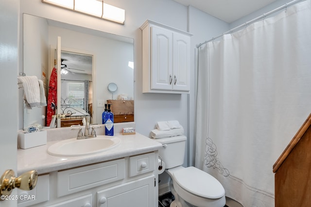 1402 New Hampshire Ave, Lynn Haven, FL 32444 - full bathroom with vanity, toilet, a ceiling fan, and ensuite bathroom
