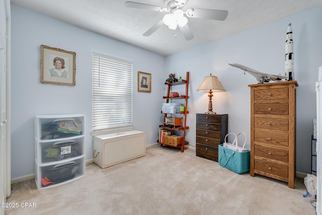 1402 New Hampshire Ave, Lynn Haven, FL 32444 - carpeted bedroom with ceiling fan, baseboards, and a textured ceiling