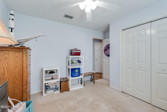 1402 New Hampshire Ave, Lynn Haven, FL 32444 - bedroom with carpet flooring, a closet, ceiling fan, and baseboards