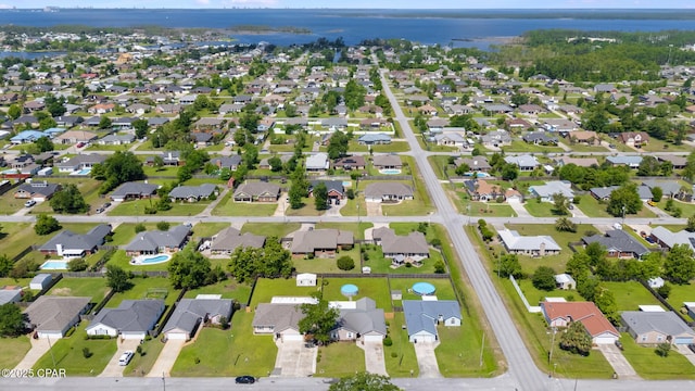 1402 New Hampshire Ave, Lynn Haven, FL 32444 - aerial view of property's location with nearby suburban area and a large body of water