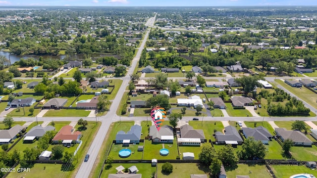 1402 New Hampshire Ave, Lynn Haven, FL 32444 - aerial view of property and surrounding area featuring nearby suburban area
