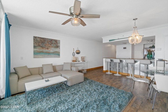 14701 Front Beach Rd Unit 1735, Panama City Beach, FL 32413 - living room featuring ornamental molding, wood finished floors, ceiling fan, a chandelier, and baseboards