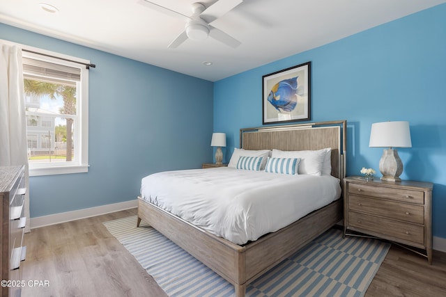 98 Shirah St, Destin, FL 32541 - bedroom with wood finished floors and a ceiling fan