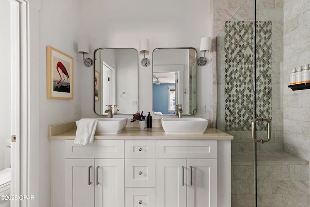 98 Shirah St, Destin, FL 32541 - bathroom featuring a stall shower and double vanity