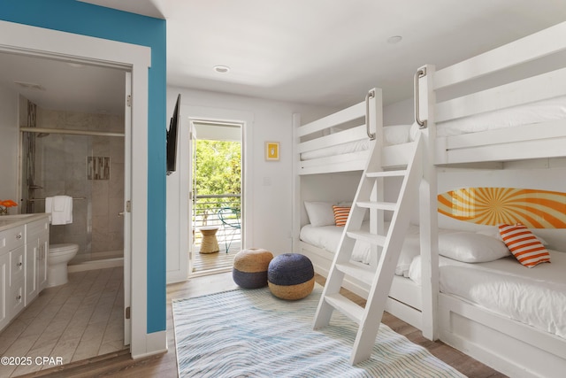 98 Shirah St, Destin, FL 32541 - bedroom with light wood-style flooring, access to exterior, and connected bathroom