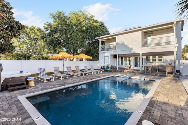 98 Shirah St, Destin, FL 32541 - view of pool featuring a hot tub, a patio area, and a fenced backyard