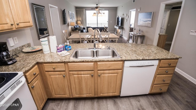17739 Front Beach Rd Unit 1007W, Panama City Beach, FL 32413 - kitchen featuring white appliances, dark wood-style floors, a peninsula, open floor plan, and light stone counters