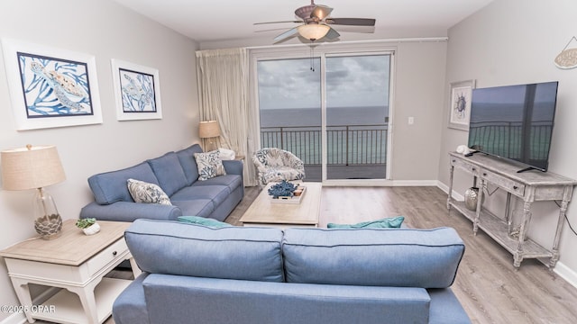 17739 Front Beach Rd Unit 1007W, Panama City Beach, FL 32413 - living room featuring wood finished floors and a ceiling fan