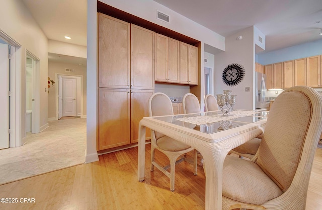 8700 Front Beach Rd Unit 7101, Panama City Beach, FL 32407 - dining room with light wood-type flooring and recessed lighting