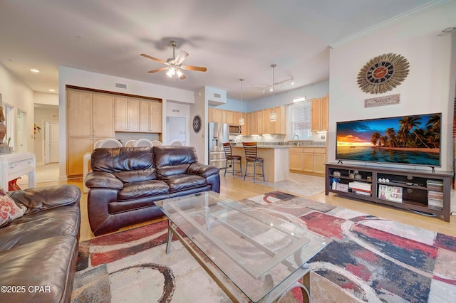 8700 Front Beach Rd Unit 7101, Panama City Beach, FL 32407 - living area featuring ceiling fan and light wood-type flooring