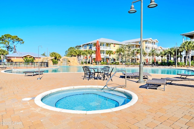 8700 Front Beach Rd Unit 7101, Panama City Beach, FL 32407 - community pool featuring a patio area