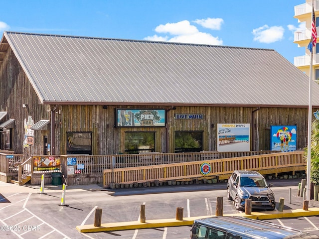 9850 S Thomas Dr Unit 1112E, Panama City Beach, FL 32408 - view of commercial property featuring uncovered parking