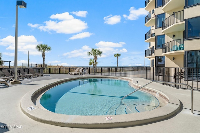 9850 S Thomas Dr Unit 1112E, Panama City Beach, FL 32408 - community pool with a patio
