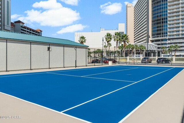 9850 S Thomas Dr Unit 1112E, Panama City Beach, FL 32408 - view of tennis court with community basketball court