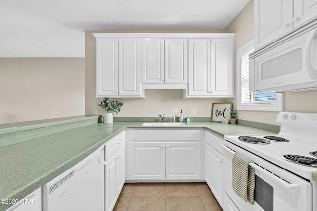 216 Bonita Cir Unit C, Panama City, FL 32408 - kitchen with white appliances, a sink, white cabinets, and light countertops