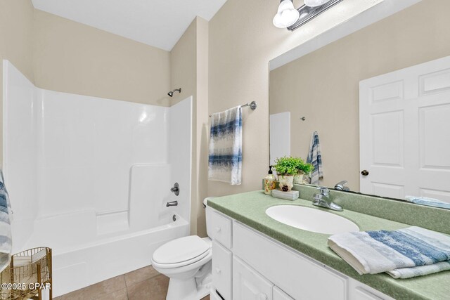 216 Bonita Cir Unit C, Panama City, FL 32408 - bathroom featuring tile patterned flooring, toilet, vanity, and  shower combination