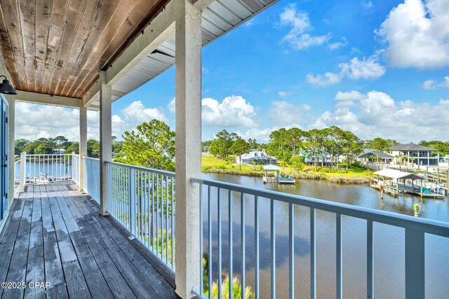 216 Bonita Cir Unit C, Panama City, FL 32408 - wooden deck with a water view